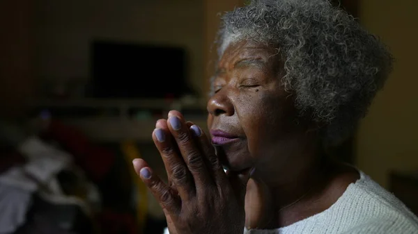 A Senior black woman in meditation