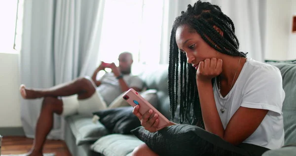 Teen Daughter Father Sitting Home Sofa Using Smartphone Device Each — Stockfoto