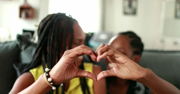 Mixed Race Mother Teen Daughter Making Heart Symbol Hands — Fotografia de Stock