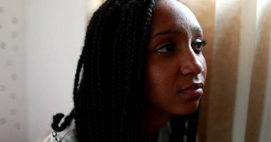Pensive black teen girl. Thoughtful African american adolescent teenager in dilemma