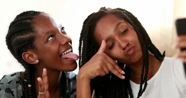 Two Teenage Black Girls Taking Selfie Smartphone —  Fotos de Stock