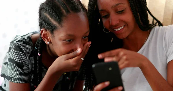 Two Teen African Girls Reacting Shock News Smartphone Sisters Covering — Stockfoto