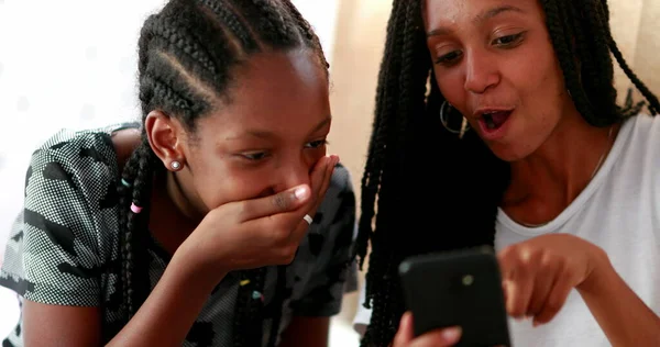 Two Teen African Girls Reacting Shock News Smartphone Sisters Covering — 스톡 사진