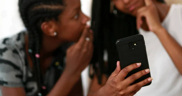 Two Black Girls Looking Cellphone Screen Laughing Together African American — 스톡 사진