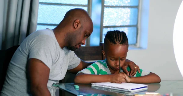 Father Helping Son Homework Home African Black Dad Mentoring Little — Stockfoto