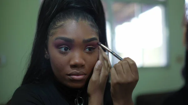 Young Black Girl Applying Make Front Mirror — Stockfoto