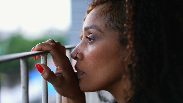 Black Woman Opening Eyes Leaning Balcony Bars Staring Horizon — Stock Photo, Image