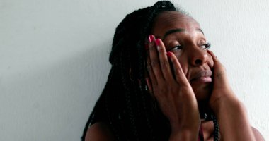 Mixed race woman feeling anxiety and worry