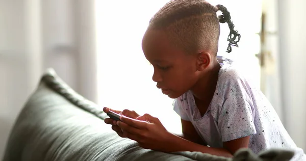 Mixed Race Boy Playing Video Game Cellphone Device — Photo