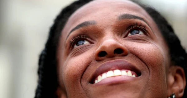 African ethnicity woman close-up face smiling