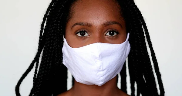 Black Girl Adjusting Covid Face Mask African Teen Wearing Mask — Stok fotoğraf