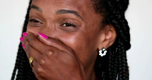 African Woman Covering Mouth Holding Laughter — Stock Fotó