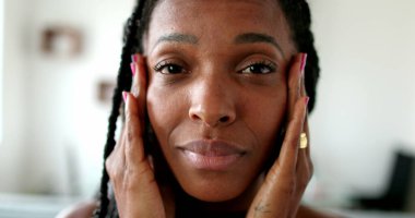 Anxious black African woman, stressed lady portrait face