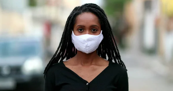 African Girl Putting Covid Face Mask Prevention Street Staring Camera — Fotografia de Stock