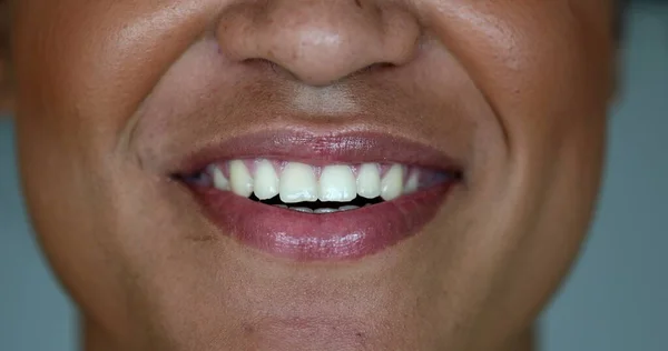 African black woman talking to camera, close-up mouth in conversation talking