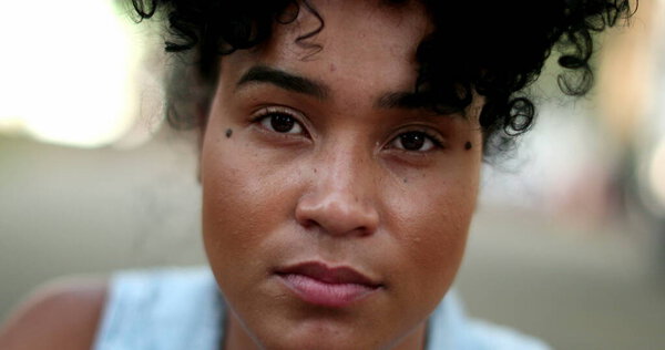 Serious young millennial african american woman portrait