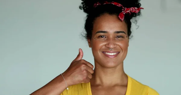 Young Mixed Race Woman Giving Thumb Camera — Stockfoto