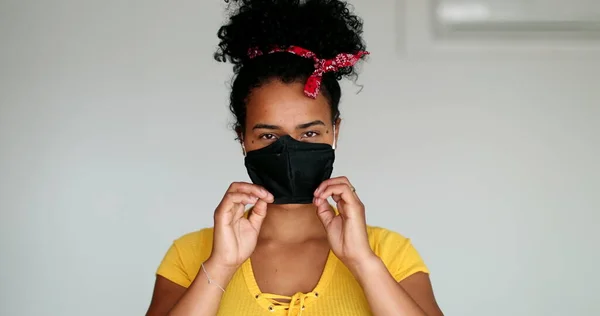 Mixed Race Young Woman Puts Face Mask Prevention Virus Outbreak — Stok fotoğraf