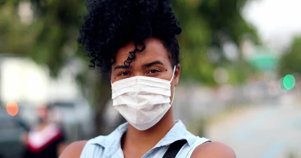 Mixed Race Woman Putting Covid Face Mask Urban Background — Fotografia de Stock
