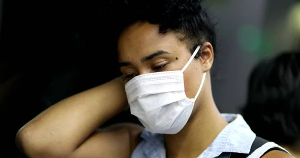 Commuter African Woman Wearing Face Mask Checking Cellphone While Riding — Fotografia de Stock