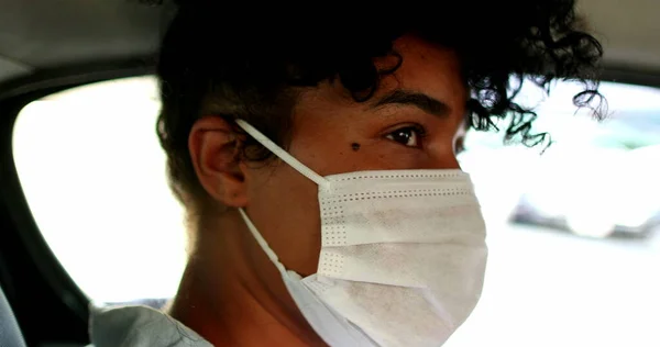 Young Millennial Black Woman Wearing Pandemic Face Mask Looking Camera — стоковое фото