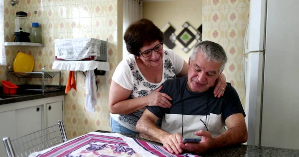 Happily married older couple love and care embrace