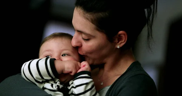 Casual Mother Kissing Baby Real Life Authentic Loving Caring Parent — Foto de Stock