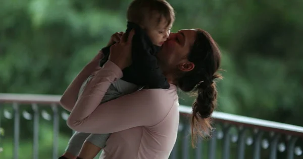 Casual Mother Loving Embracing Baby Infant Balcony — Foto de Stock