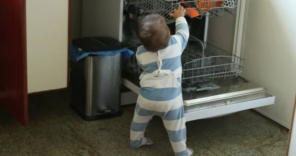 Cute Baby Standing Next Dishwasher Wanting Help Infant Boy Playing —  Fotos de Stock