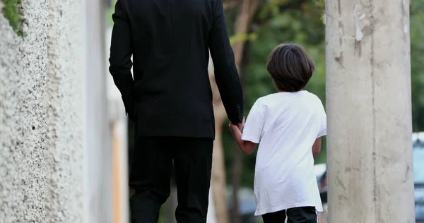 Father Holding Hands Child Boy Walking City Sidewalk — Stockfoto