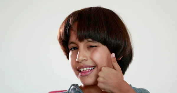 Happy Kid Giving Guarantee Thumb Hand Winking Camera — Stockfoto