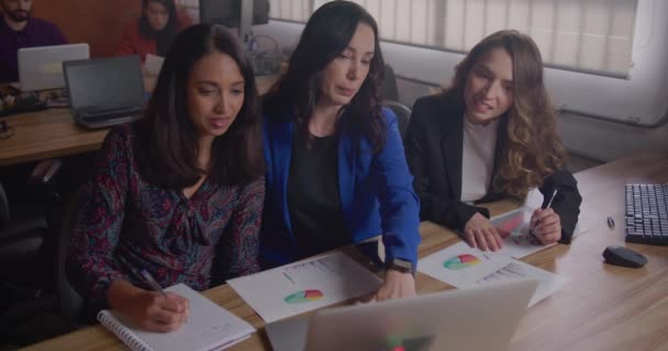 Senior Business Woman Coaching Female Staff Looking Graphs Statistics Sitting — Video