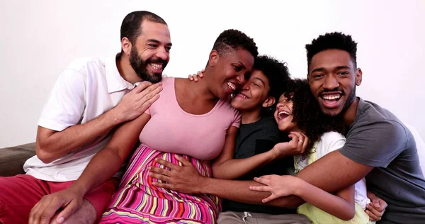 African Family Hugging Home Sofa Mixed Race Black Parents Children — 스톡 사진