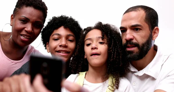 African Descent Family Looking Cellphone Together — Stockfoto