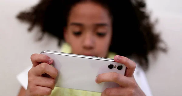 Child Playing Game Cellphone Sitting Couch — Stockfoto