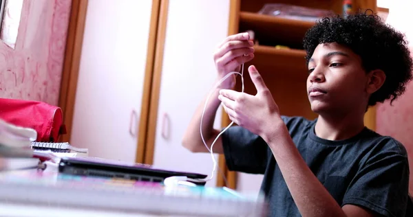 Child Sitting Desk Opens Laptop Turns Computer Preparing Homework Online — Stock fotografie