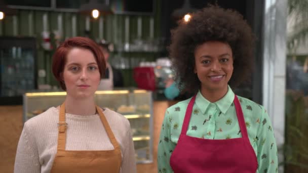 Portrait Two Diverse Young Employees Wearing Aprons Standing Coffee Shop — Stockvideo
