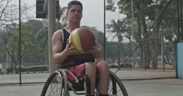 One Disabled Basketball Player Spinning Ball Portrait Hispanic Latin Paraplegic — ストック動画