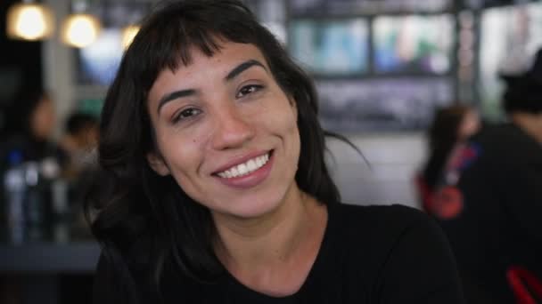 Portrait Hispanic Latin Girl Smiling Camera Sitting Restaurant Cafe — Vídeos de Stock