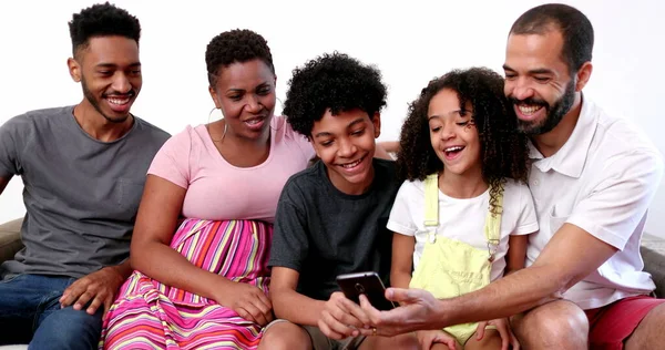 Happy African Interracial Family Holding Smartphone Parents Kids Looking Cellphone — Stockfoto