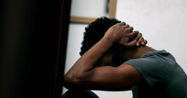 Frustrated black man feeling anxiety. Anxious Candid African person in depression