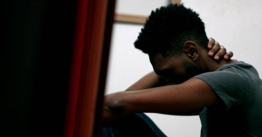 Frustrated black man feeling anxiety. Anxious Candid African person in depression