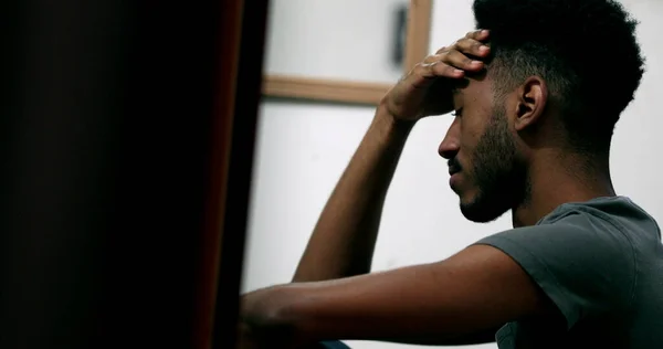 Frustrated black man feeling anxiety. Anxious Candid African person in depression