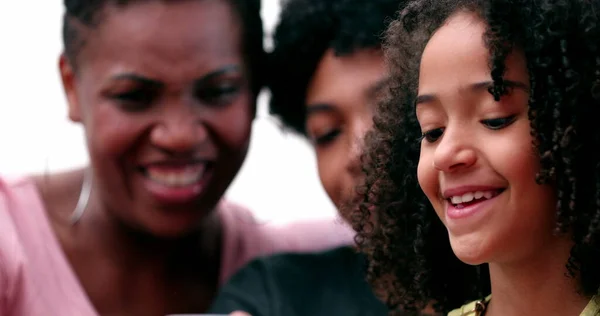 Happy Multiracial Family Laughing Smiling Together Looking Phone Real Life — Photo