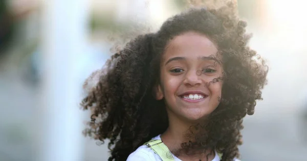 Happy Female Child Smiling Mixed Race Kid Curly Hair Wind — Stockfoto