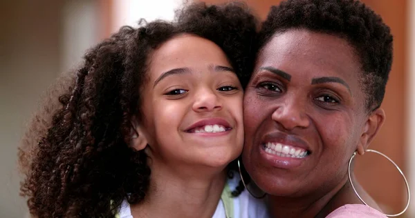 Happy African Mother Daughter Posing Camera Smiling Cheek Cheek — Stockfoto