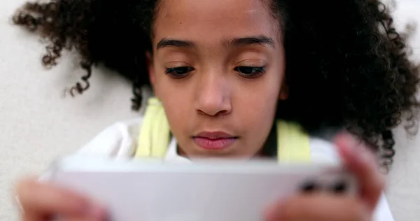 Little Girl Holding Smartphone Mixed Race Black Child Watching Content — Photo