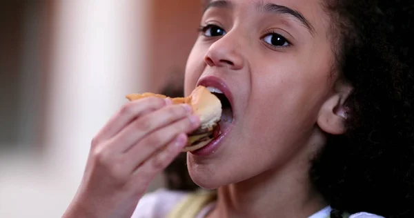 Little Girl Eating Burger Child Taking Bite Hamburger — Fotografia de Stock