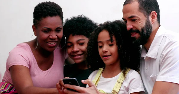 Interracial Family Using Cellphone Mixed Race Parents Children Looking Smartphone — 스톡 사진