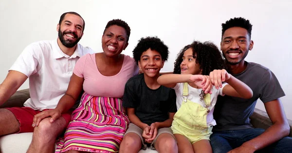 Mixed race family speaking in video long distance communication. interracial couple and kids
